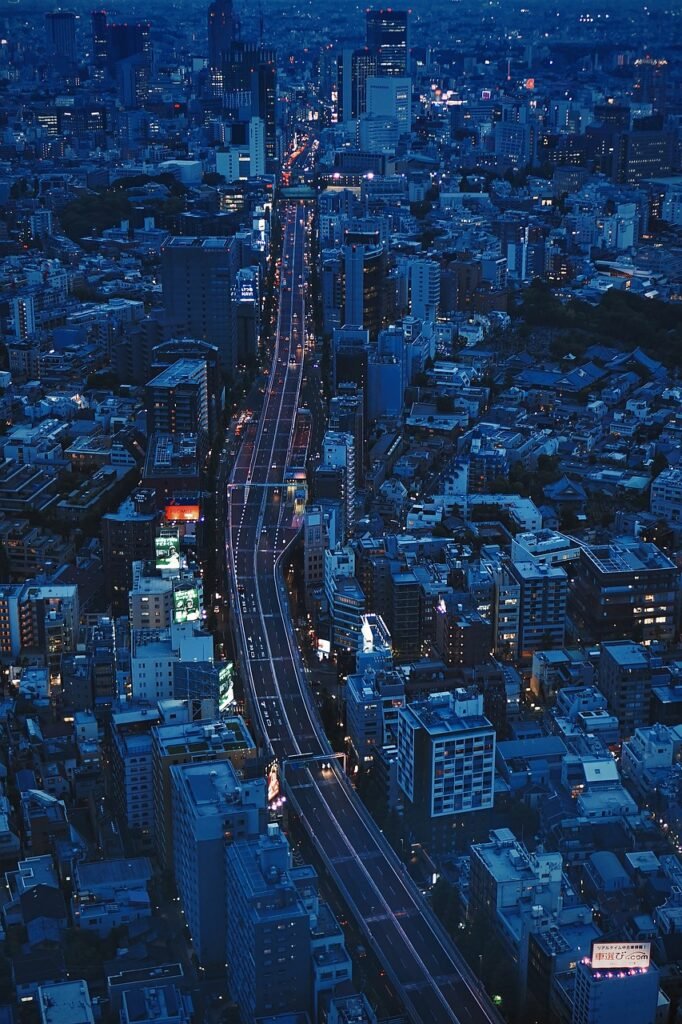 city, night, bird's eye view, aerial view, cityscape, night view, urban, metro, metropolitan, city lights, city view, phone wallpaper, buildings, street, highway, downtown, aesthetic wallpaper, iphone wallpaper
