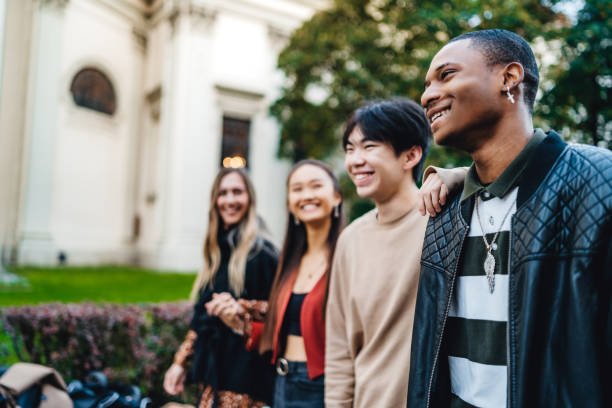 group of happy teenagers having fun in the street. friendship concept.