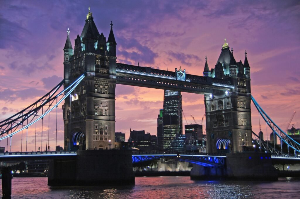 london tower bridge bridge monument 51363 51363 Iconic Tower Bridge in London against a stunning sunset sky. Perfect for travel and architecture themes.